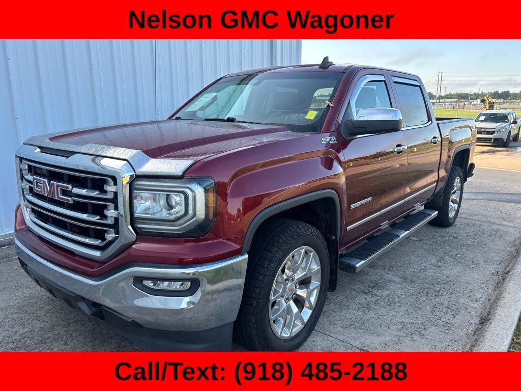 Used 2017 CRIMSON RED TINTCOAT GMC SLT image 1