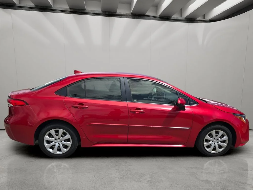 Used 2021 Barcelona Red Metallic Toyota LE image 12