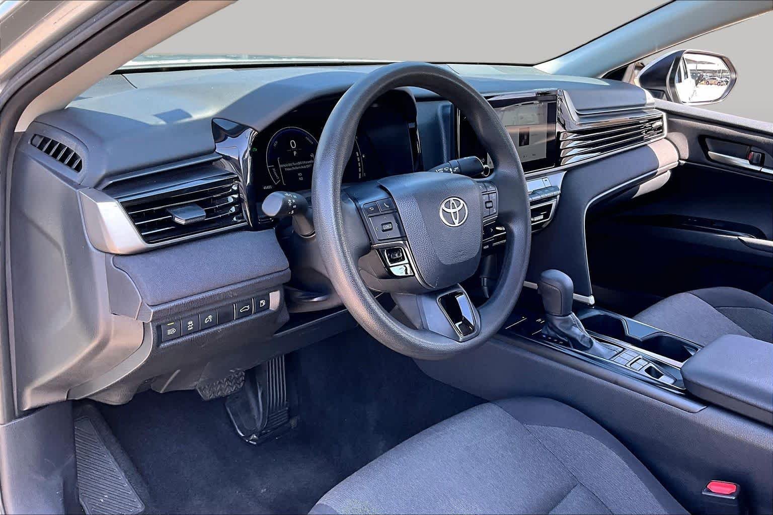 Used 2025 Celestial Silver Metallic Toyota LE image 16