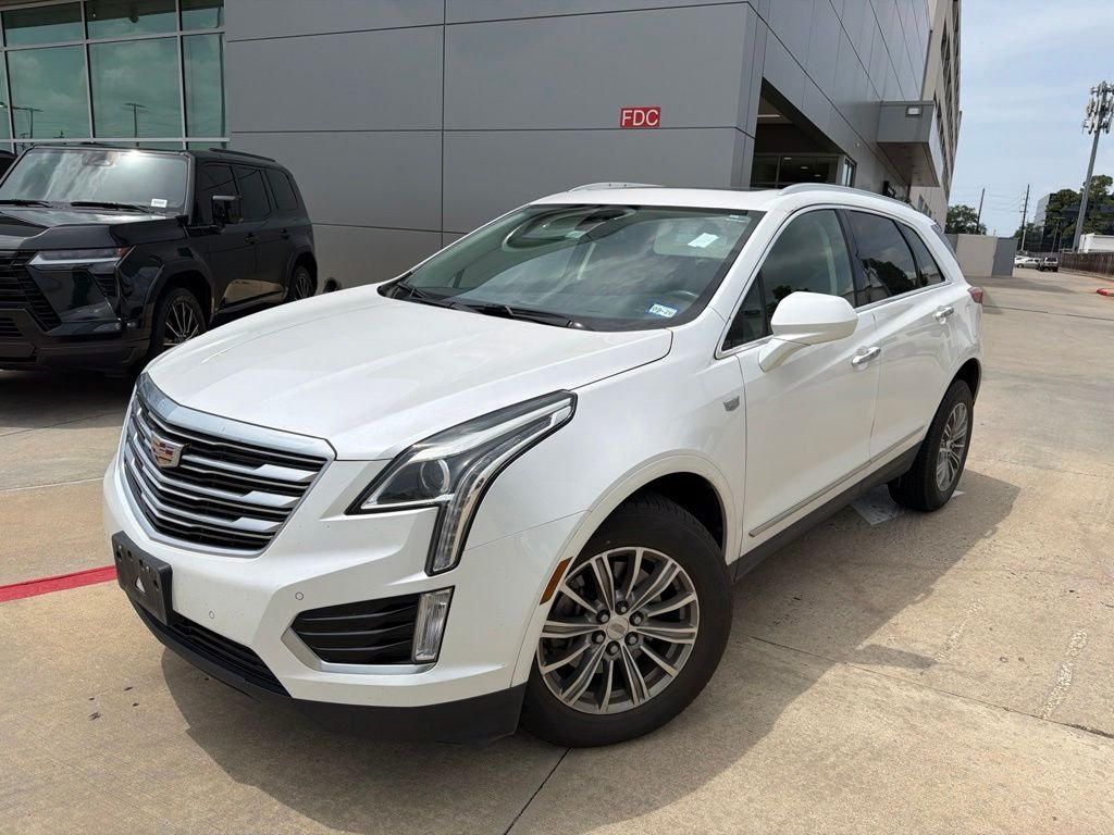 Used 2018 Crystal White Cadillac Luxury image 1