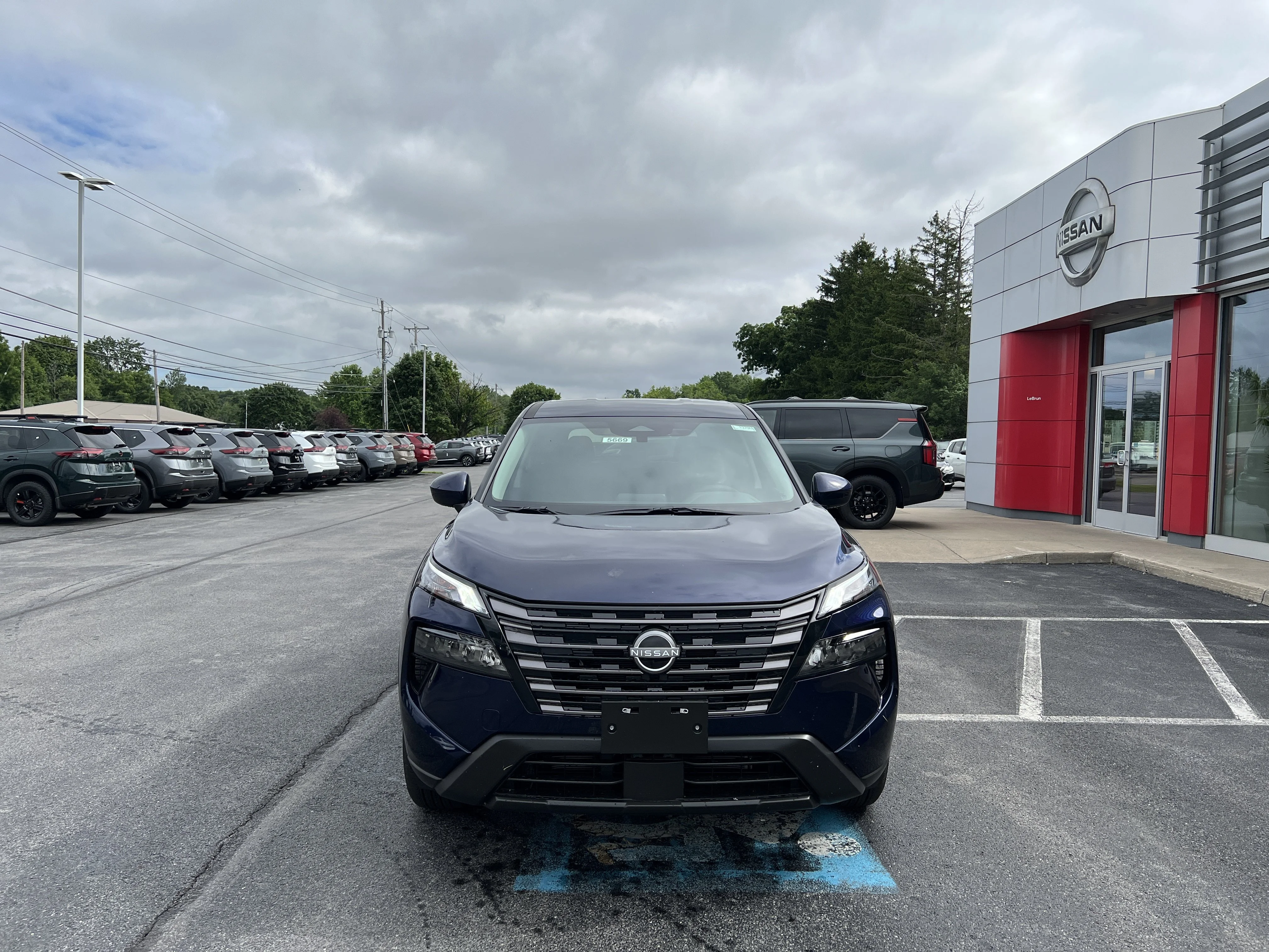 New 2026 Deep Ocean Blue Pearl Nissan SV image 2