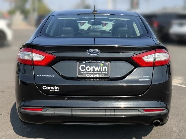 Used 2014 Tuxedo Black Metallic Ford SE image 15