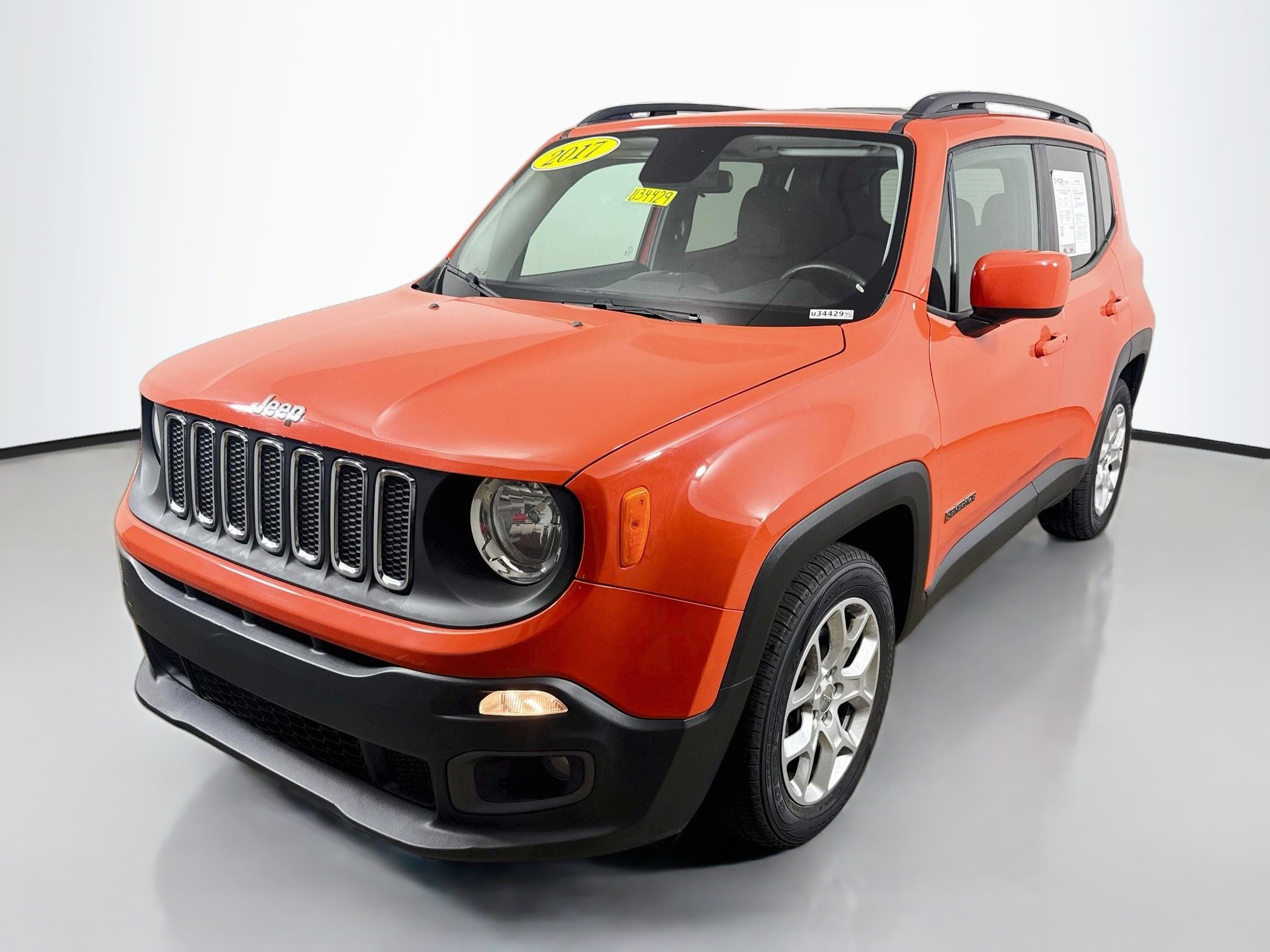 Used 2017 Omaha Orange Jeep Latitude image 3