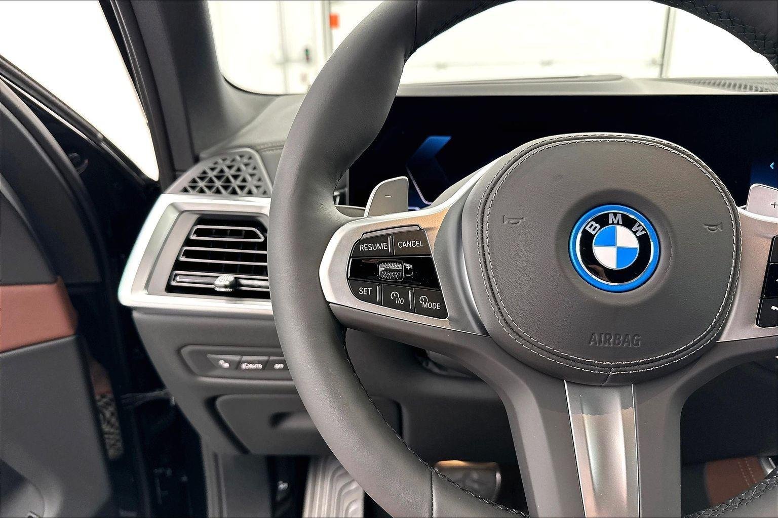 New 2026 Black Sapphire Metallic BMW xDrive50e image 14