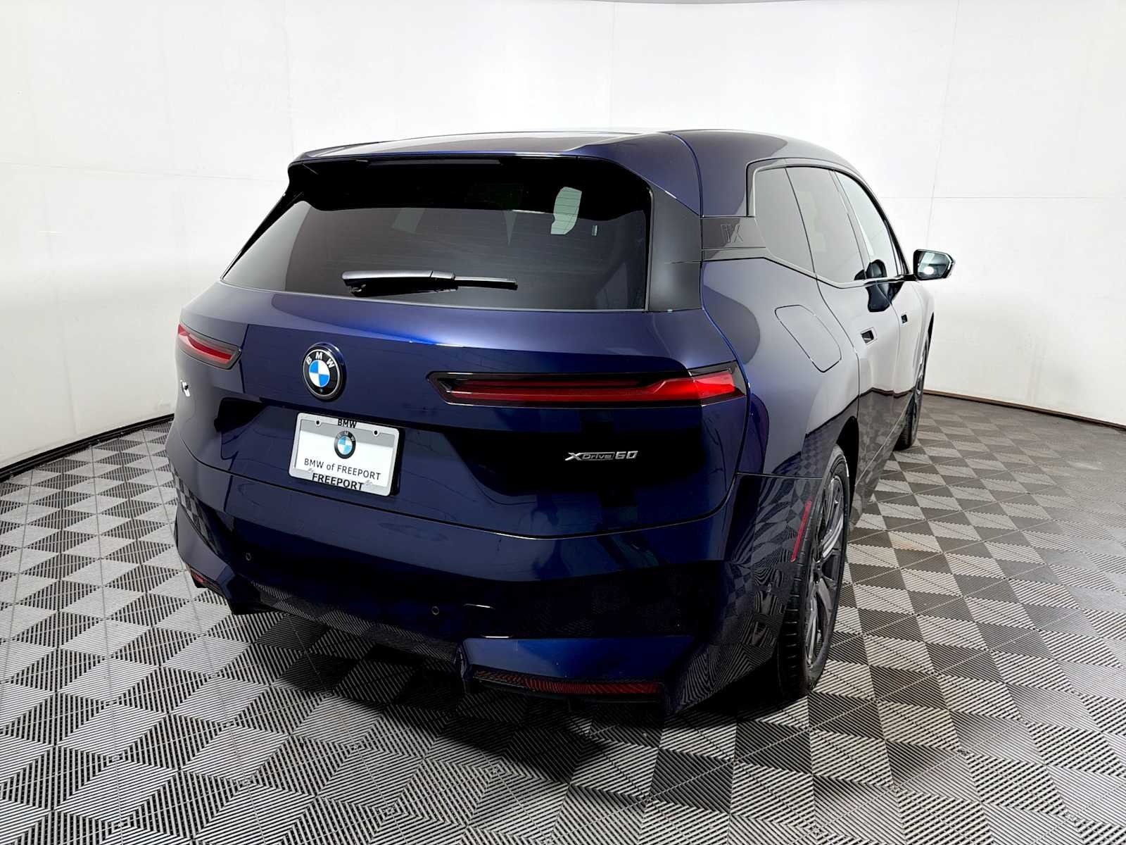Used 2026 Tanzanite Blue II Metallic BMW xDrive60 image 6