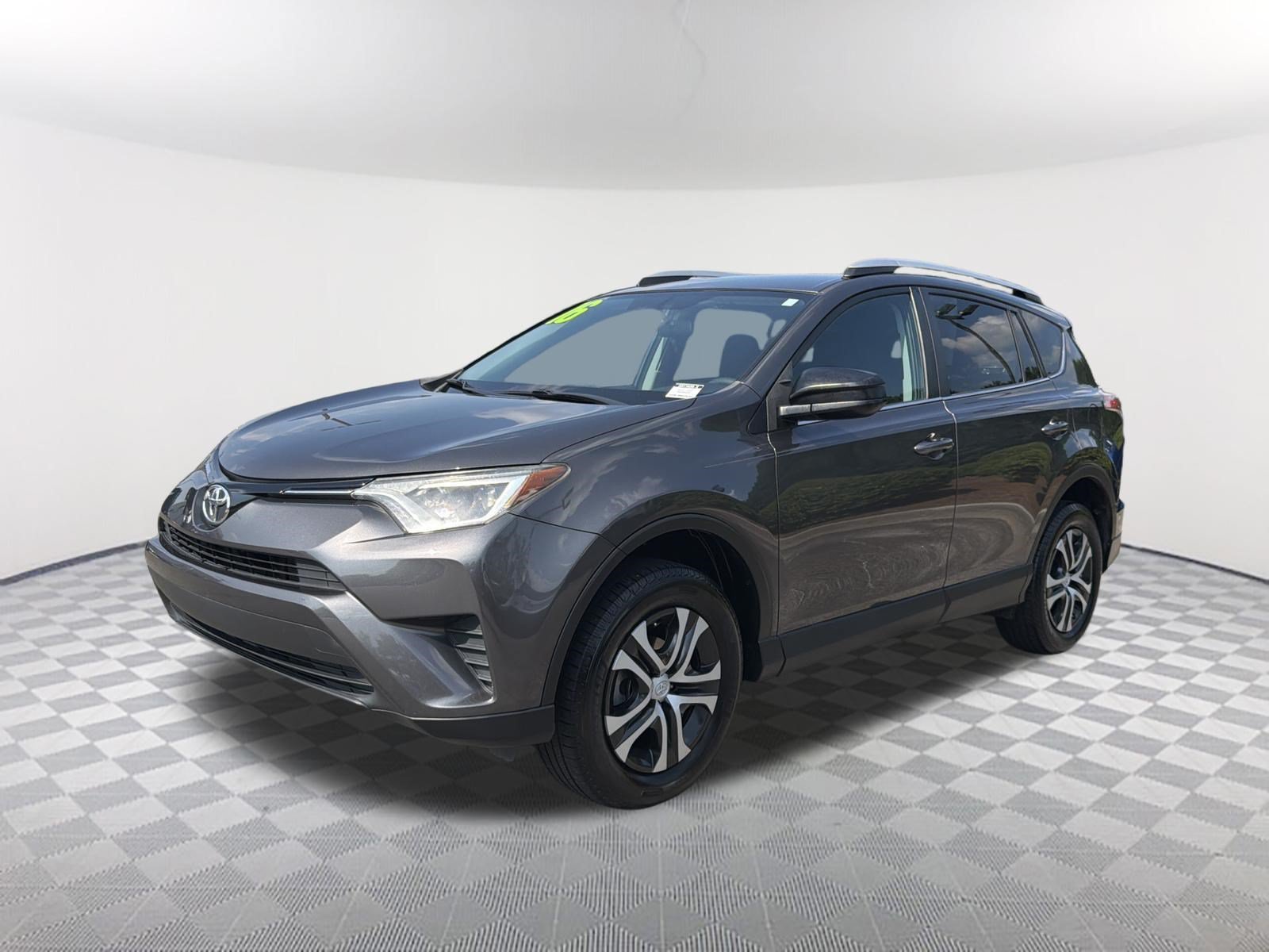 Used 2016 Magnetic Gray Metallic Toyota LE image 3