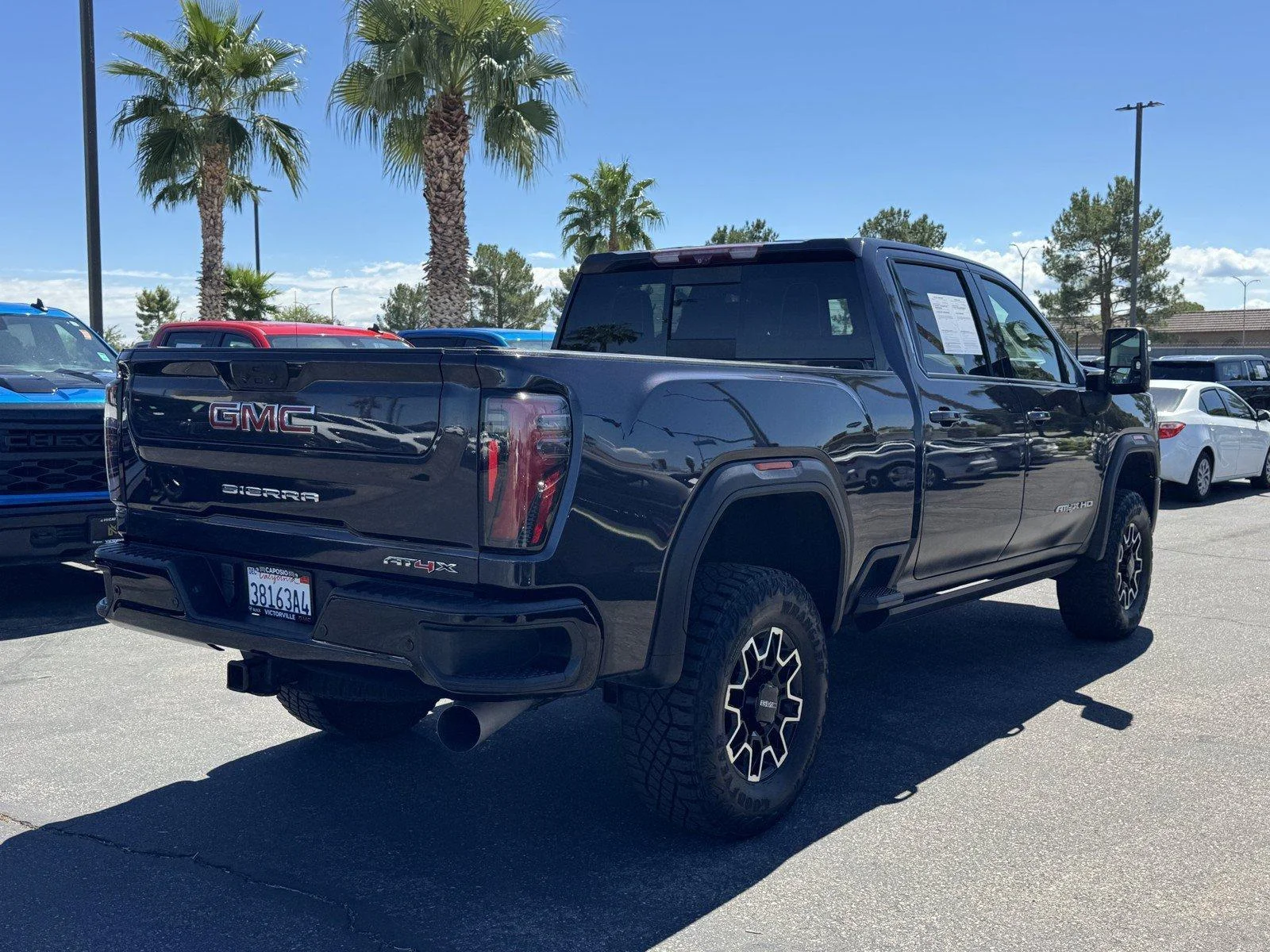 Used 2024 Titanium Rush Metallic GMC AT4X image 6