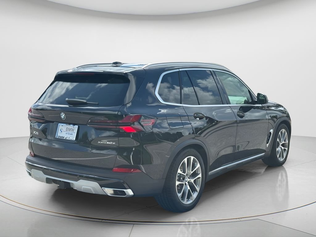 New 2026 Black Sapphire Metallic BMW xDrive50e image 5