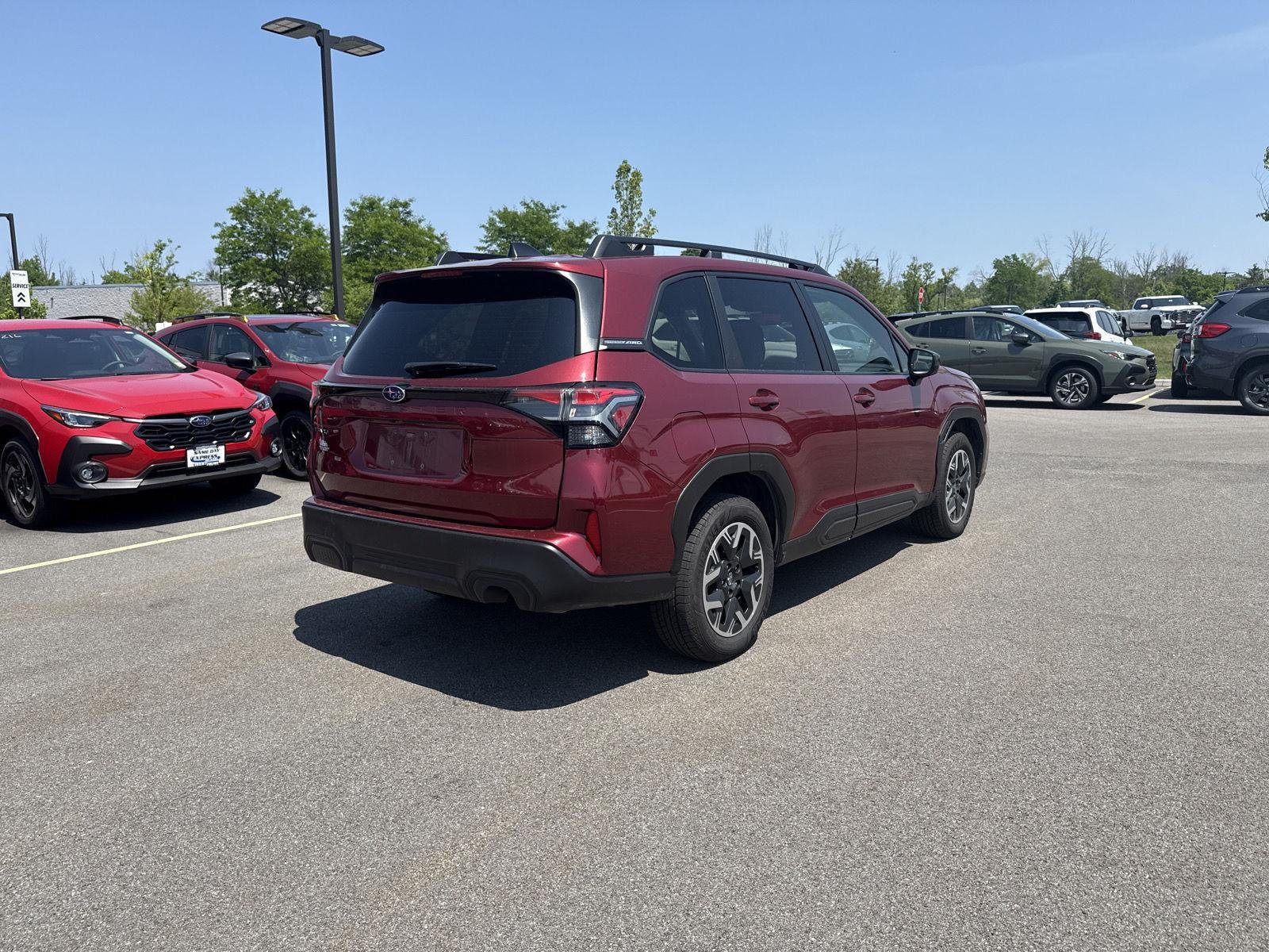 Used 2025 Crimson Red Pearl Subaru Premium image 4