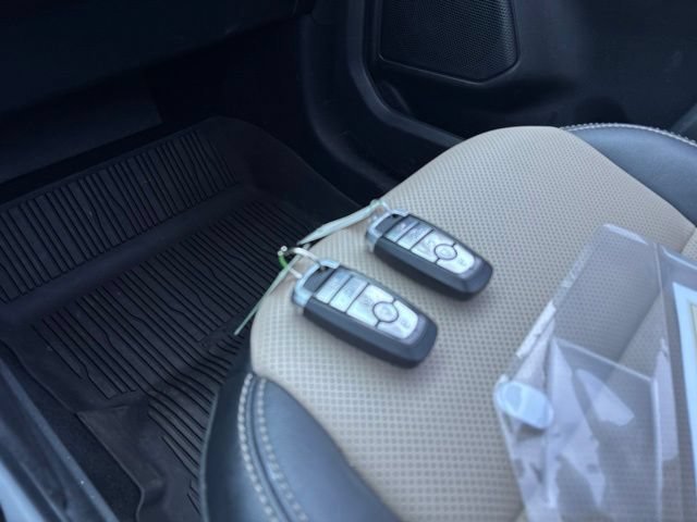 Used 2022 Blue Metallic Ford Titanium Hybrid image 22