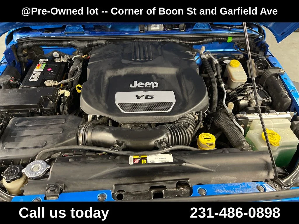 Used 2016 Blue Jeep Unlimited Sport image 4