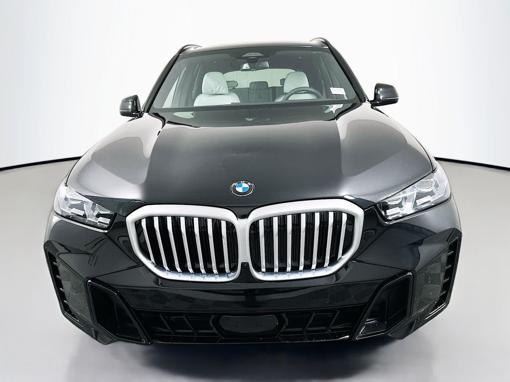 Used 2026 Black Sapphire Metallic BMW xDrive50e image 2