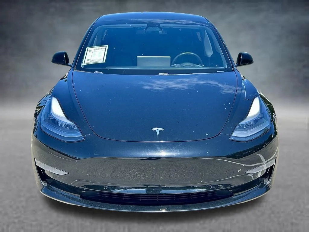 Used 2021 Tesla Model 3 Base with VIN 5YJ3E1EA1MF047146 for sale in Fort Pierce, FL