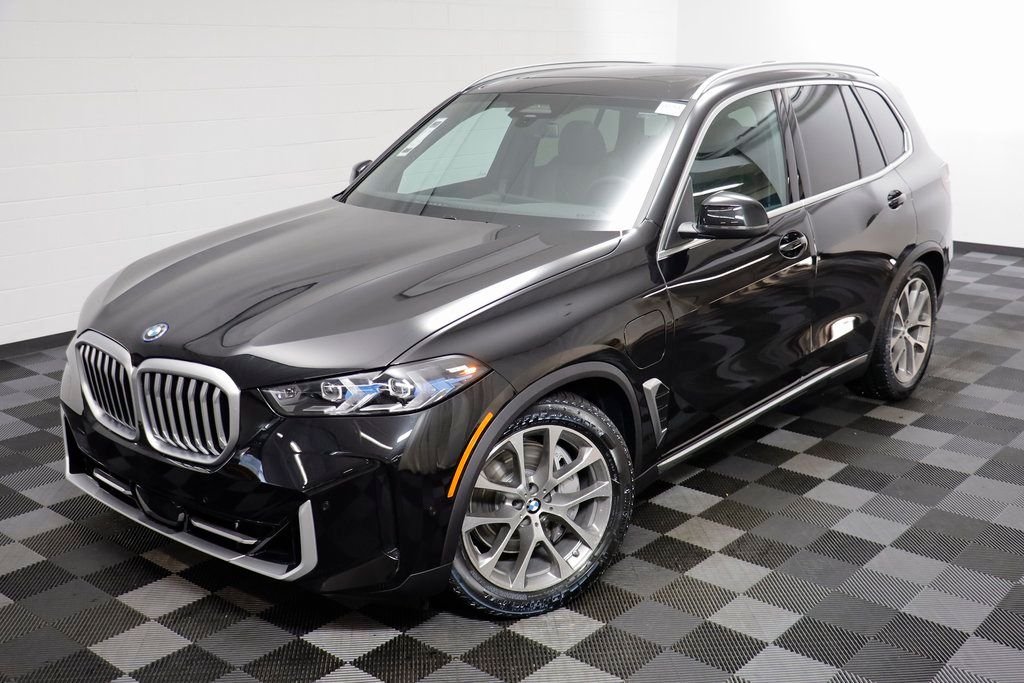 New 2026 Black Sapphire Metallic BMW xDrive50e image 2