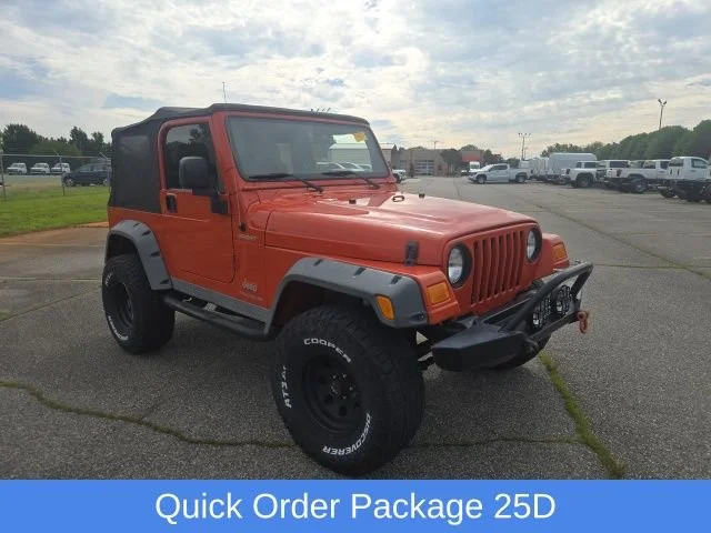 Used 2005 Impact Orange Cle Jeep Sport image 10