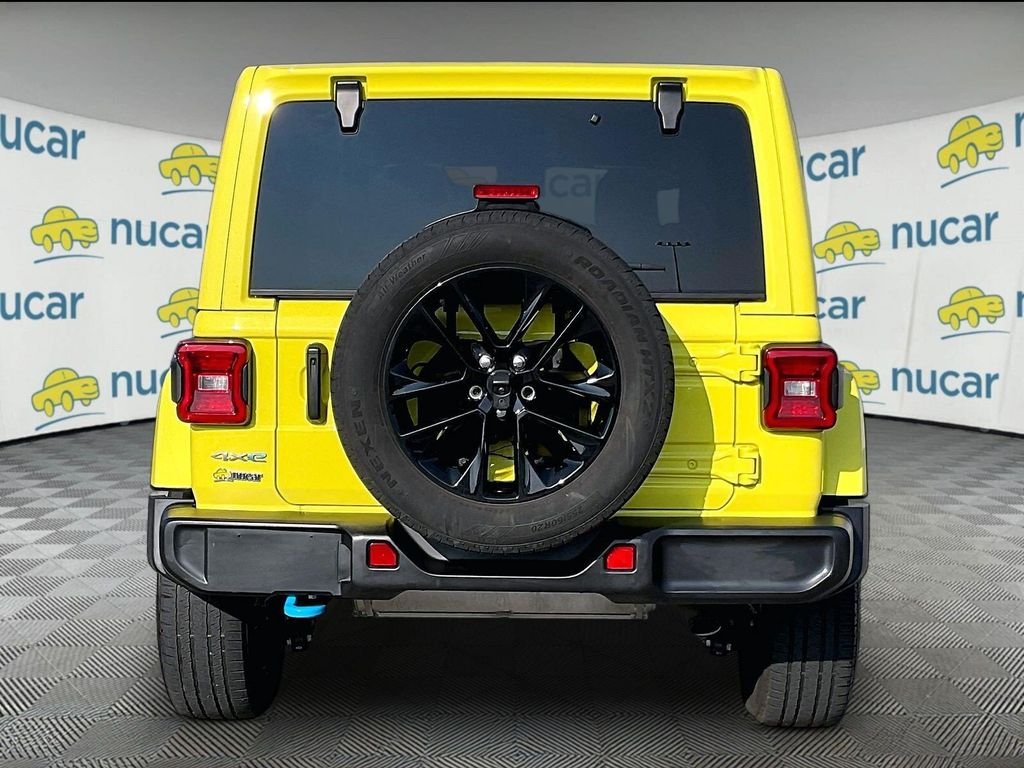 Used 2024 Yellow Jeep Sahara 4xe image 5