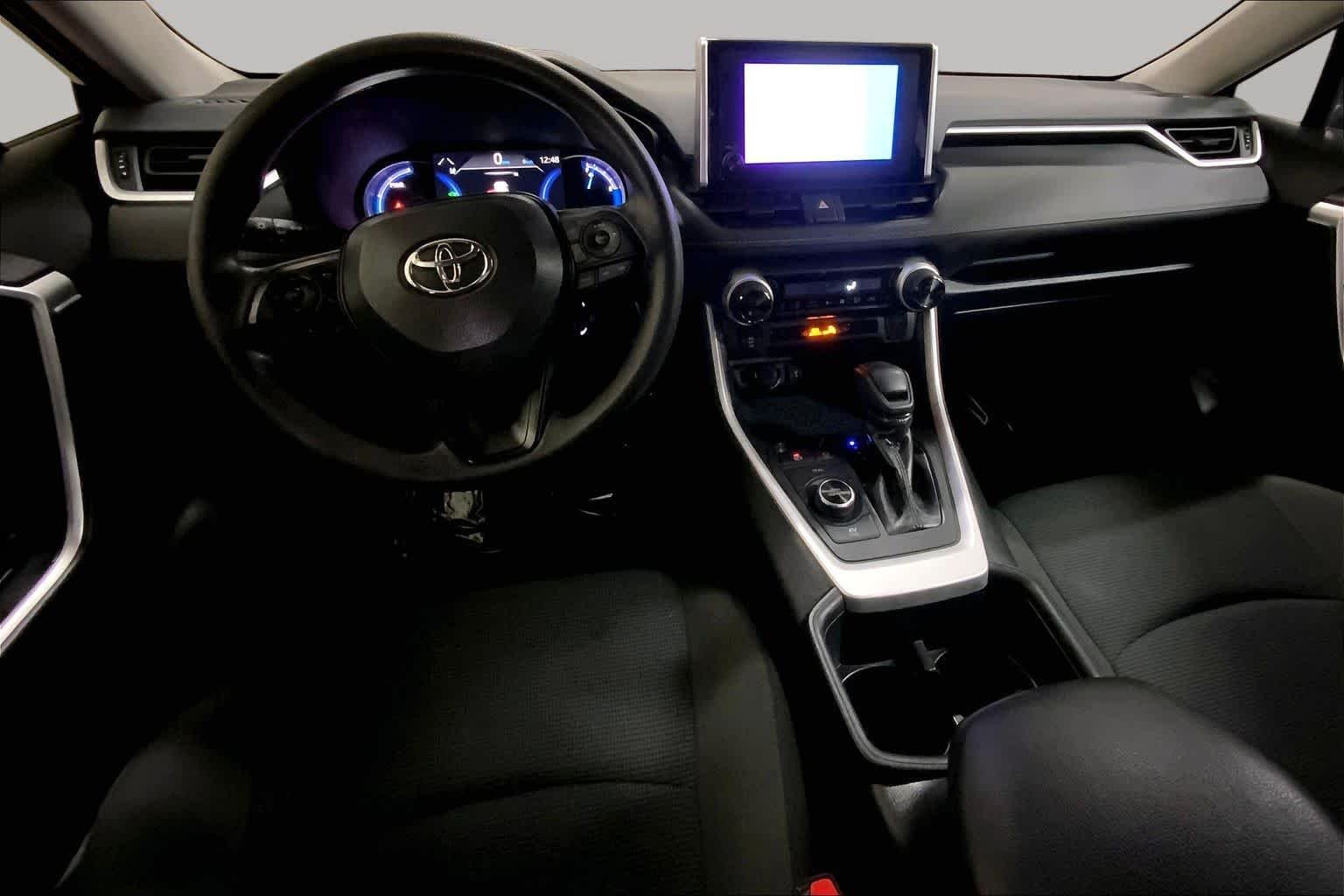 Used 2025 Midnight Black Metallic Toyota Hybrid LE image 16