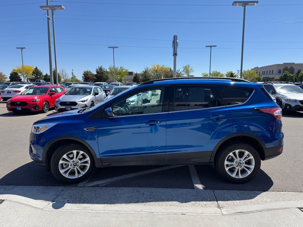 Used 2018 Lightning Blue Metallic Ford SE image 4