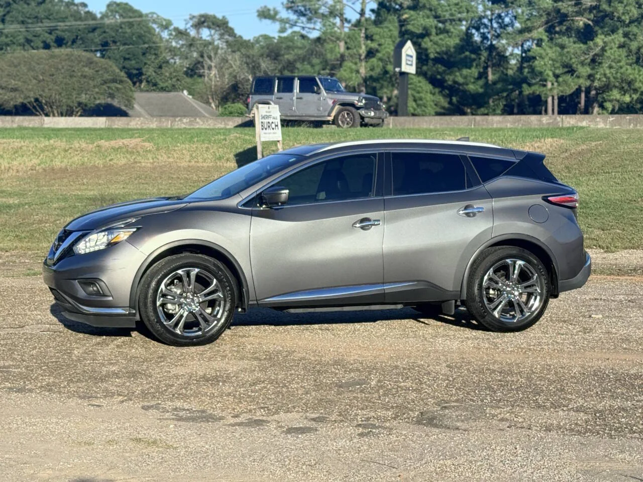 Used 2017 Gray Nissan Platinum 4dr SUV image 1