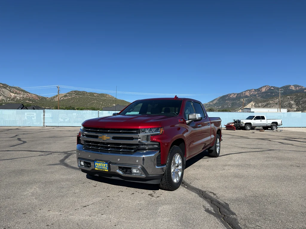 Used 2022 Cherry Red Tintcoat Chevrolet LTZ image 1
