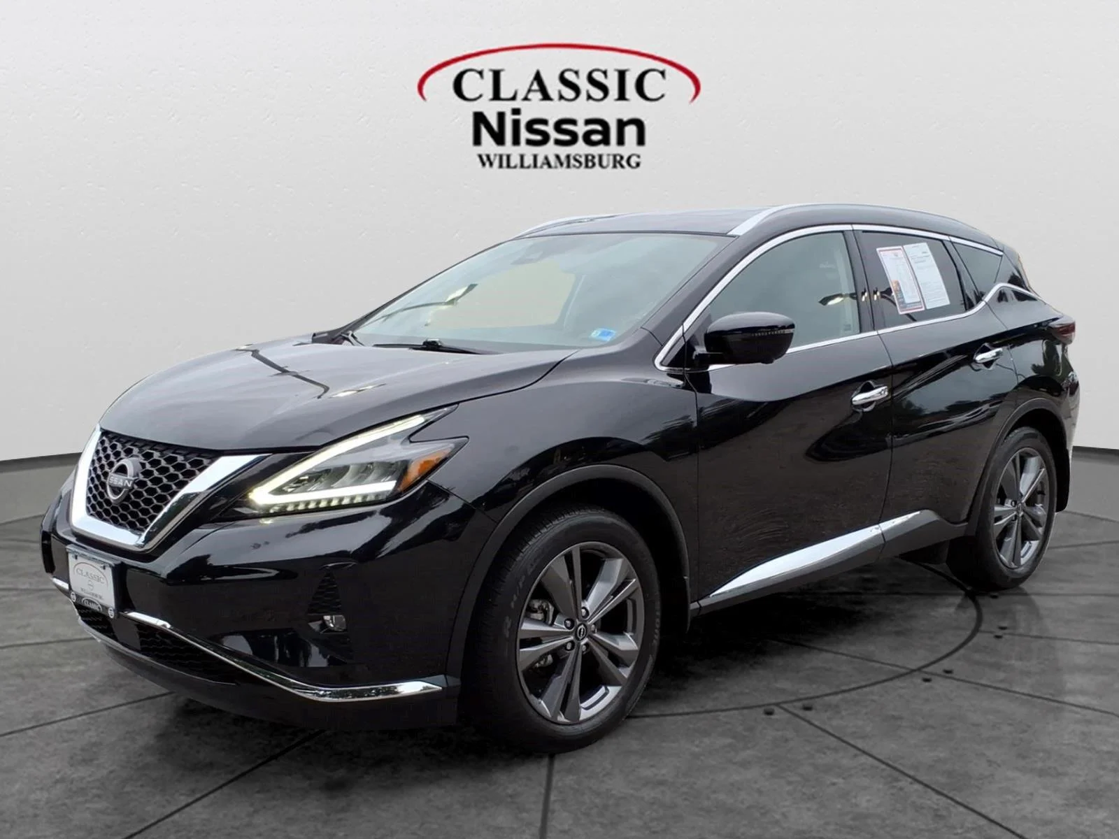 Used 2023 Super Black Nissan Platinum image 1
