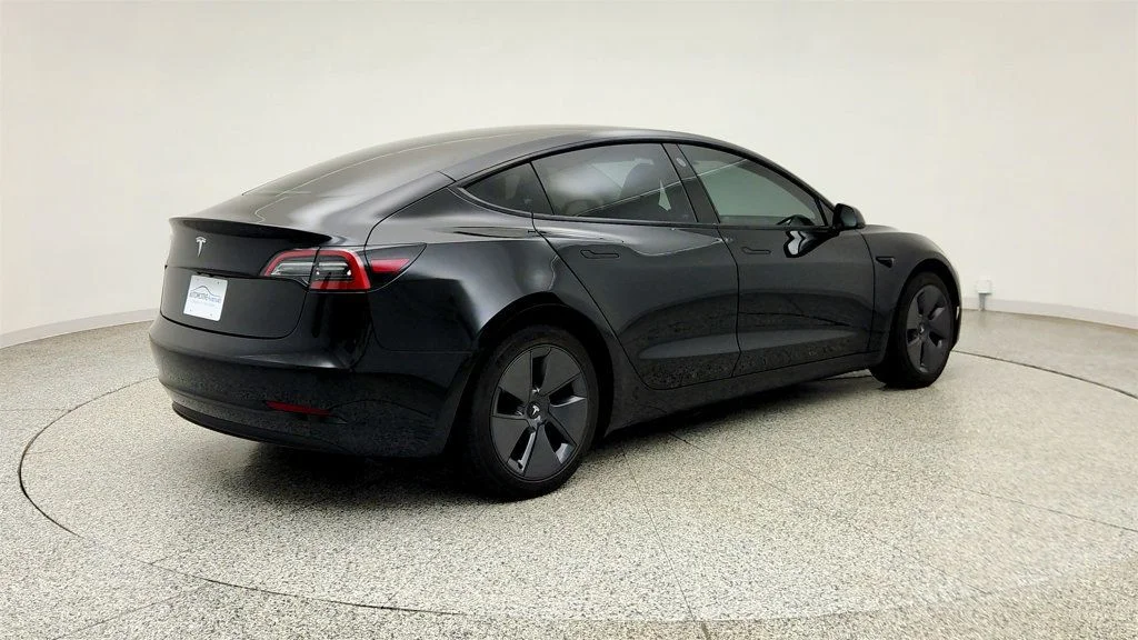 Used 2023 Solid Black Tesla RWD image 5