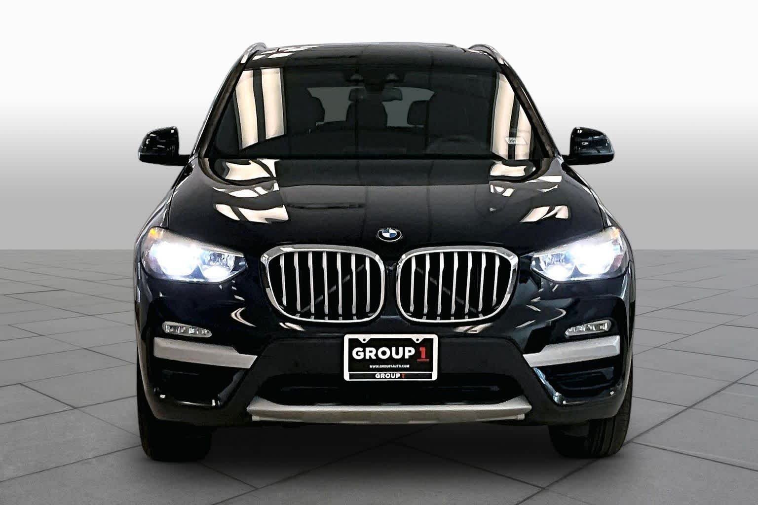 Used 2019 Black Sapphire Metallic BMW sDrive30i image 3
