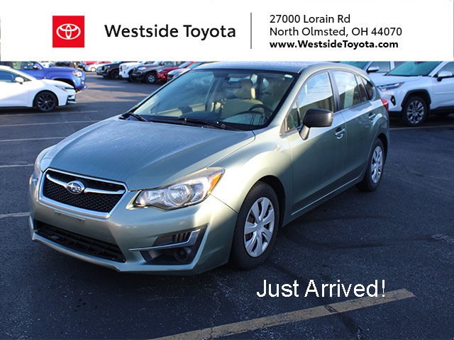 Used 2015 Green Metallic Subaru 2.0i image 1