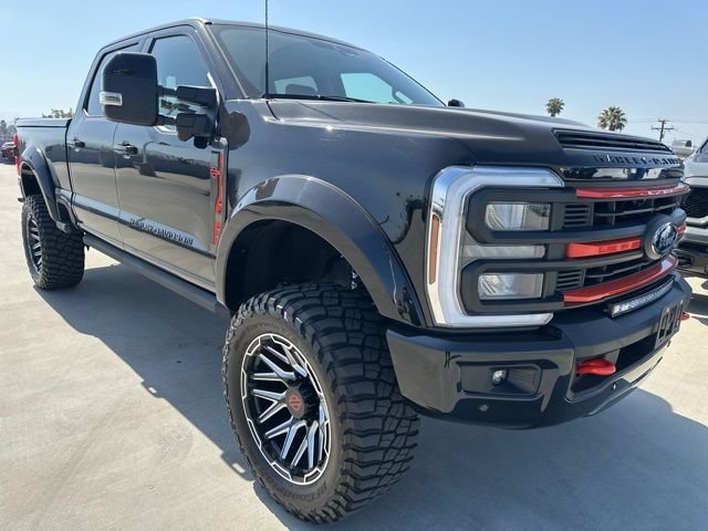 Used 2024 Agate Black Metallic Ford Lariat image 1