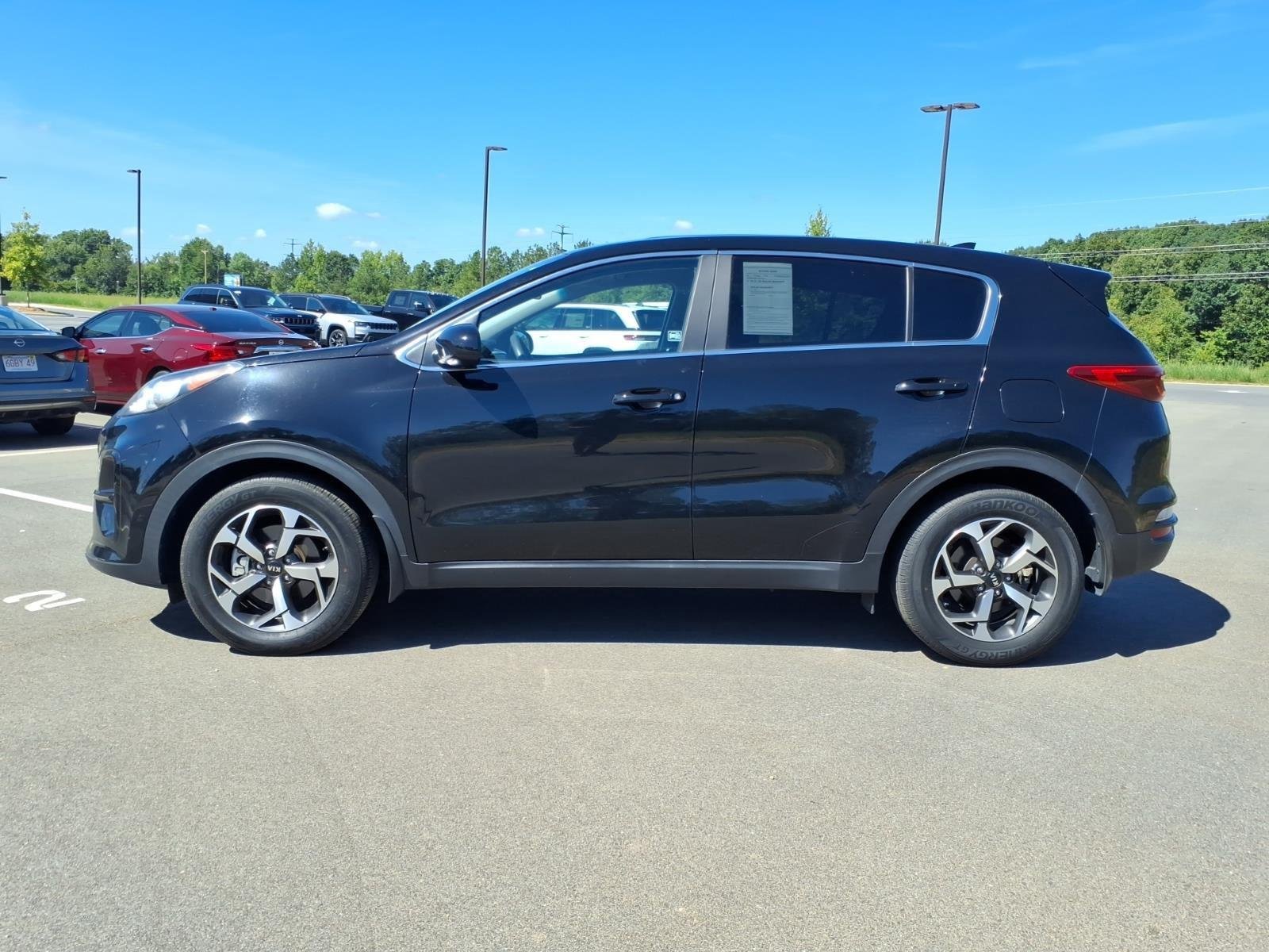 Used 2022 Black Cherry Kia LX image 3