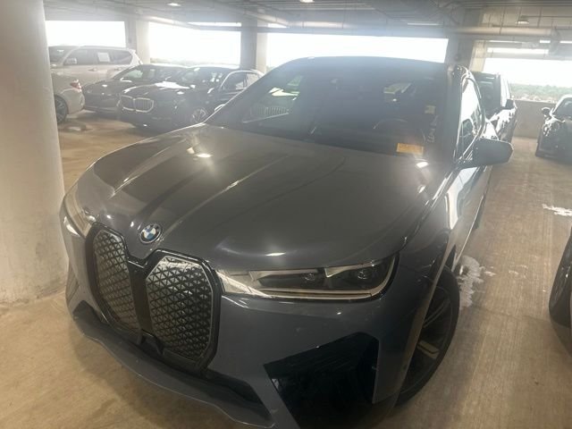 Used 2024 Storm Bay Metallic BMW xDrive50 image 1