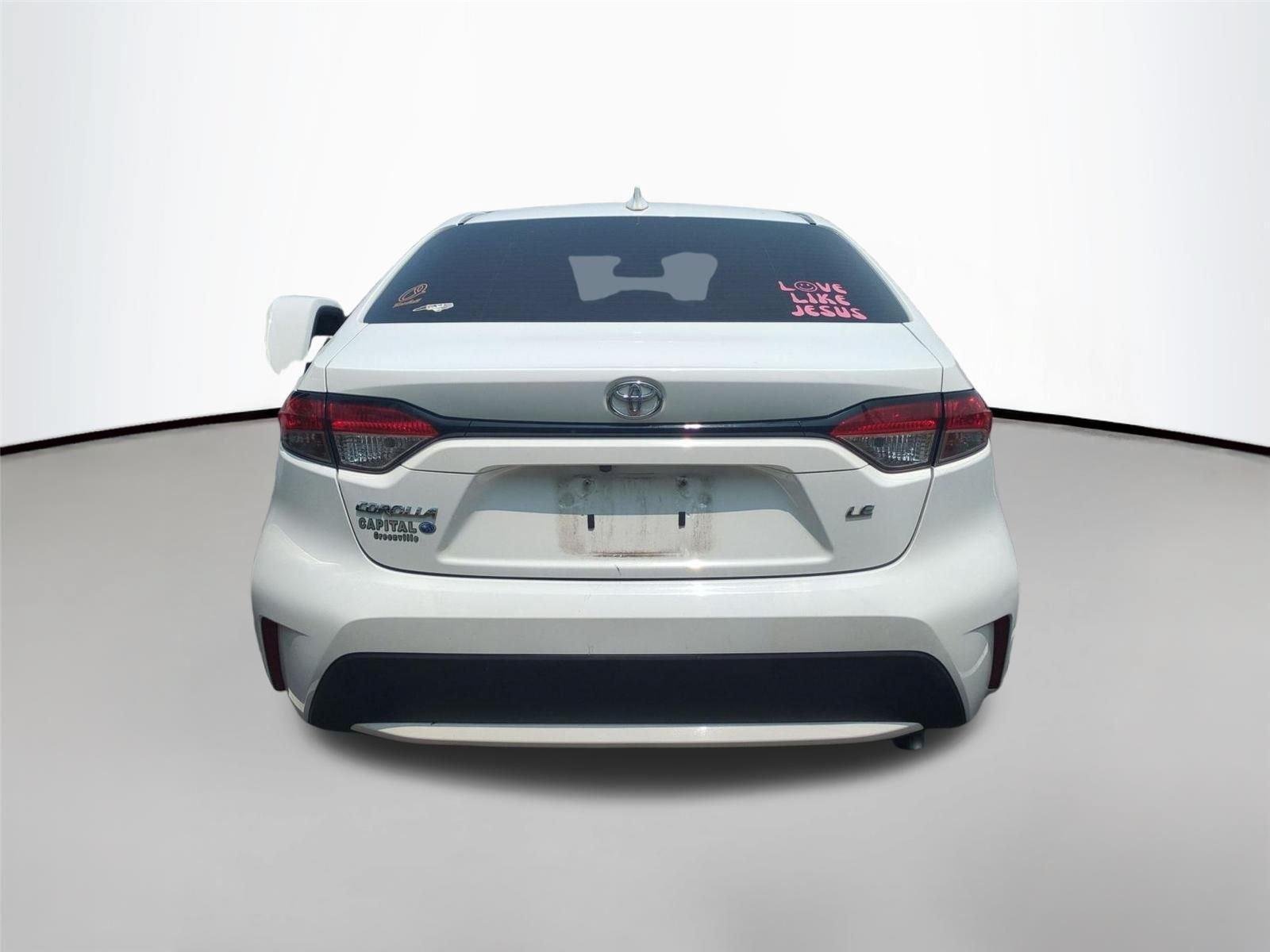 Used 2021 Super White Toyota LE image 5