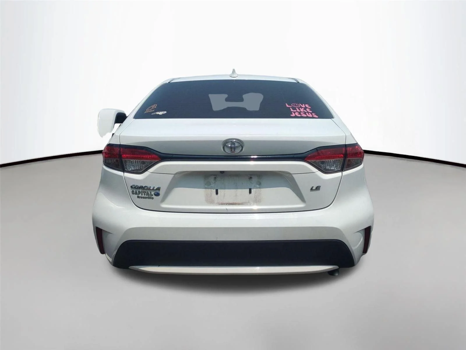 Used 2021 Super White Toyota LE image 5