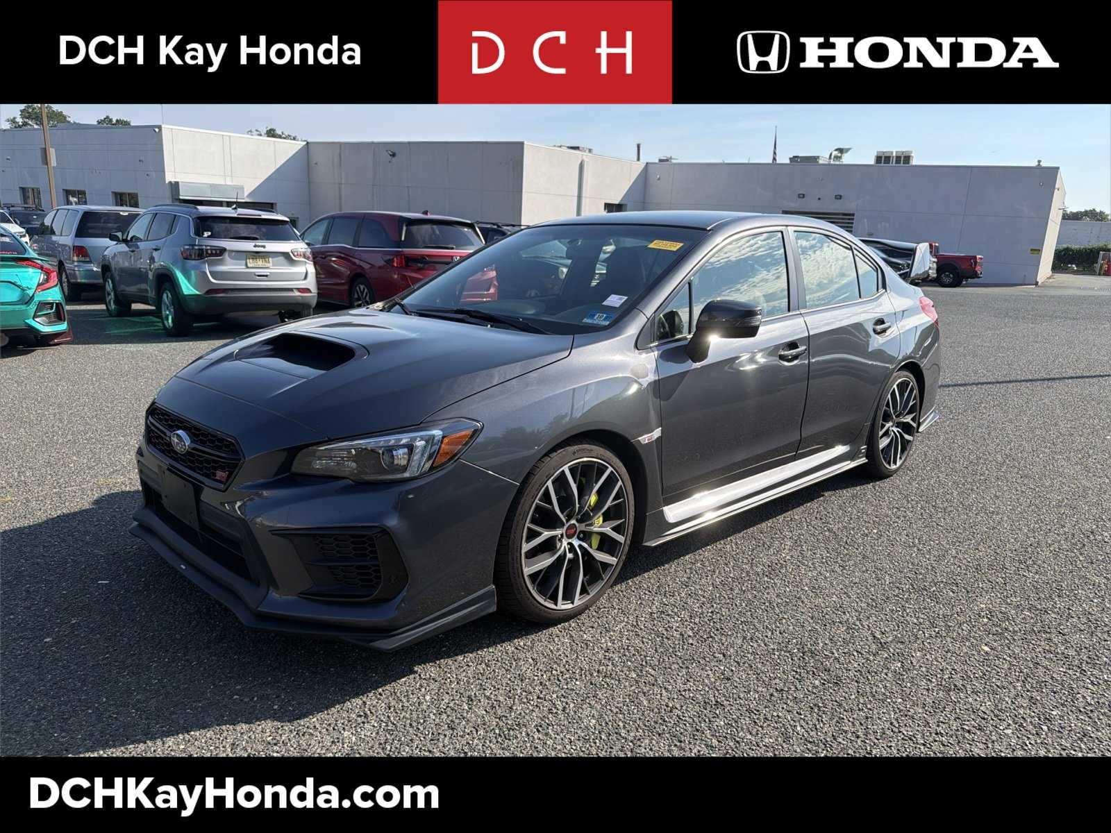 Used 2020 Magnetite Gray Metallic Subaru STI image 1