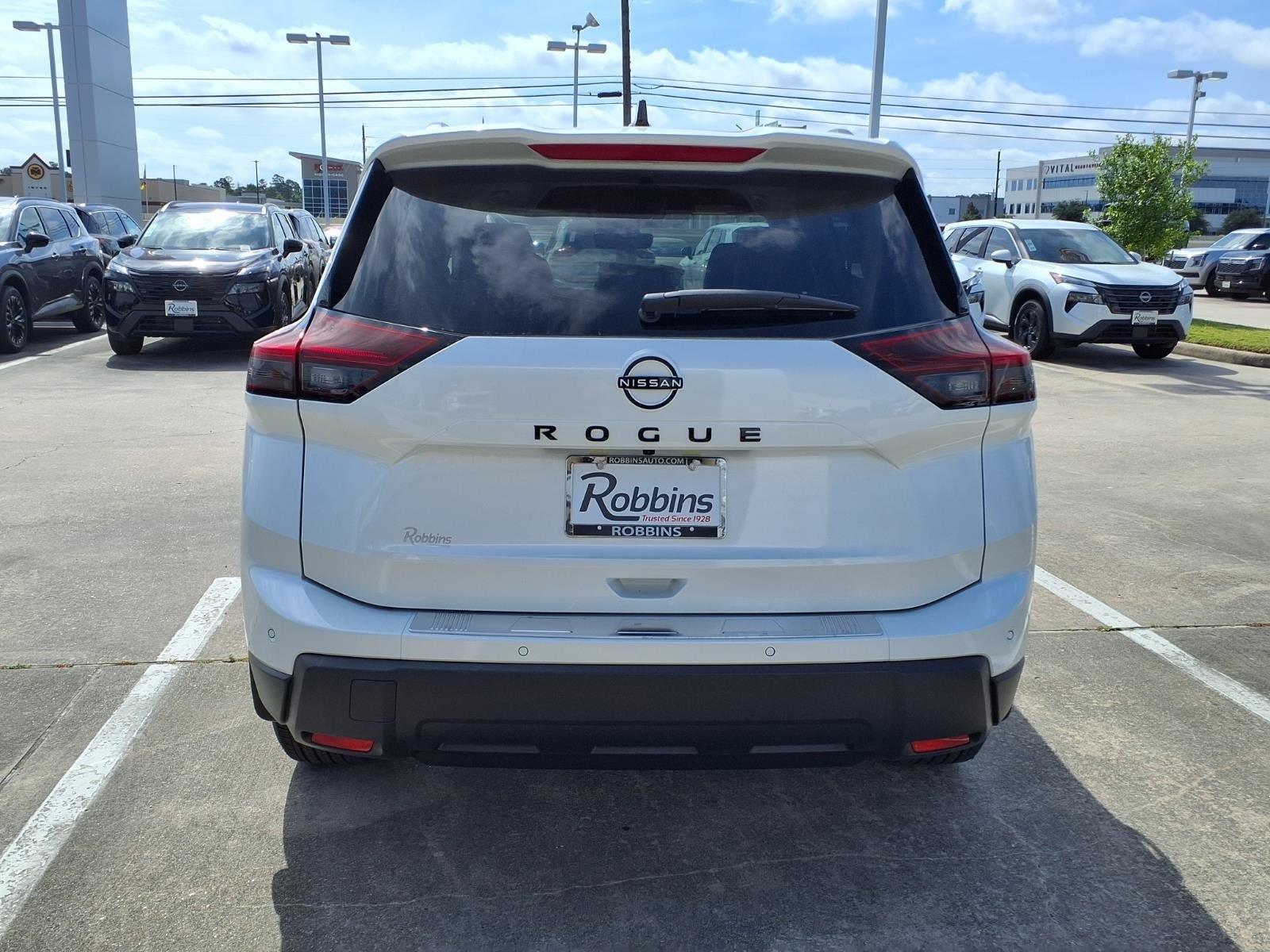 2026 Nissan Rogue Dark Armor™ White at Robbins Nissan