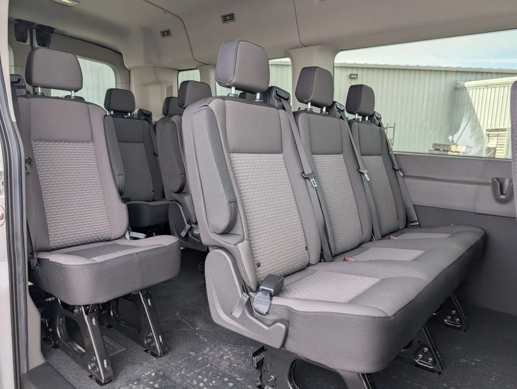 New 2026 Oxford White Ford Passenger Van XLT image 24