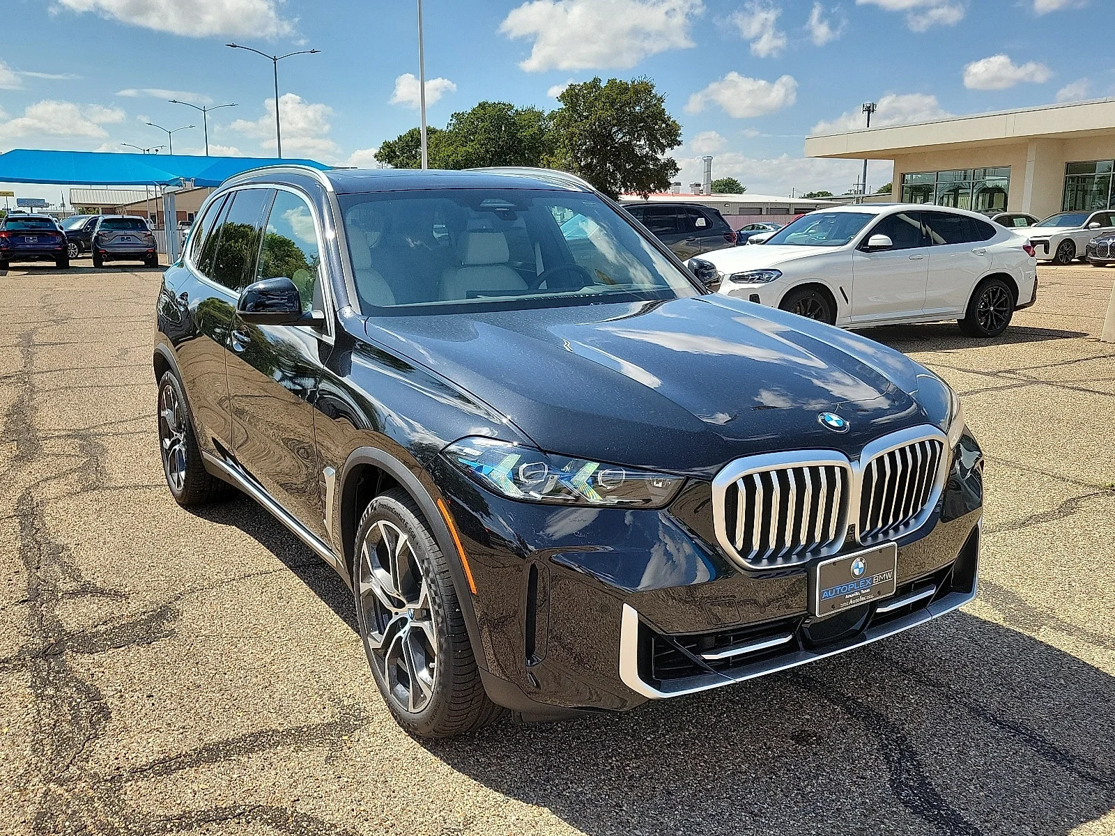 New 2026 Black Sapphire Metallic BMW xDrive40i All-Wheel Drive Sports Activity Vehicle image 6