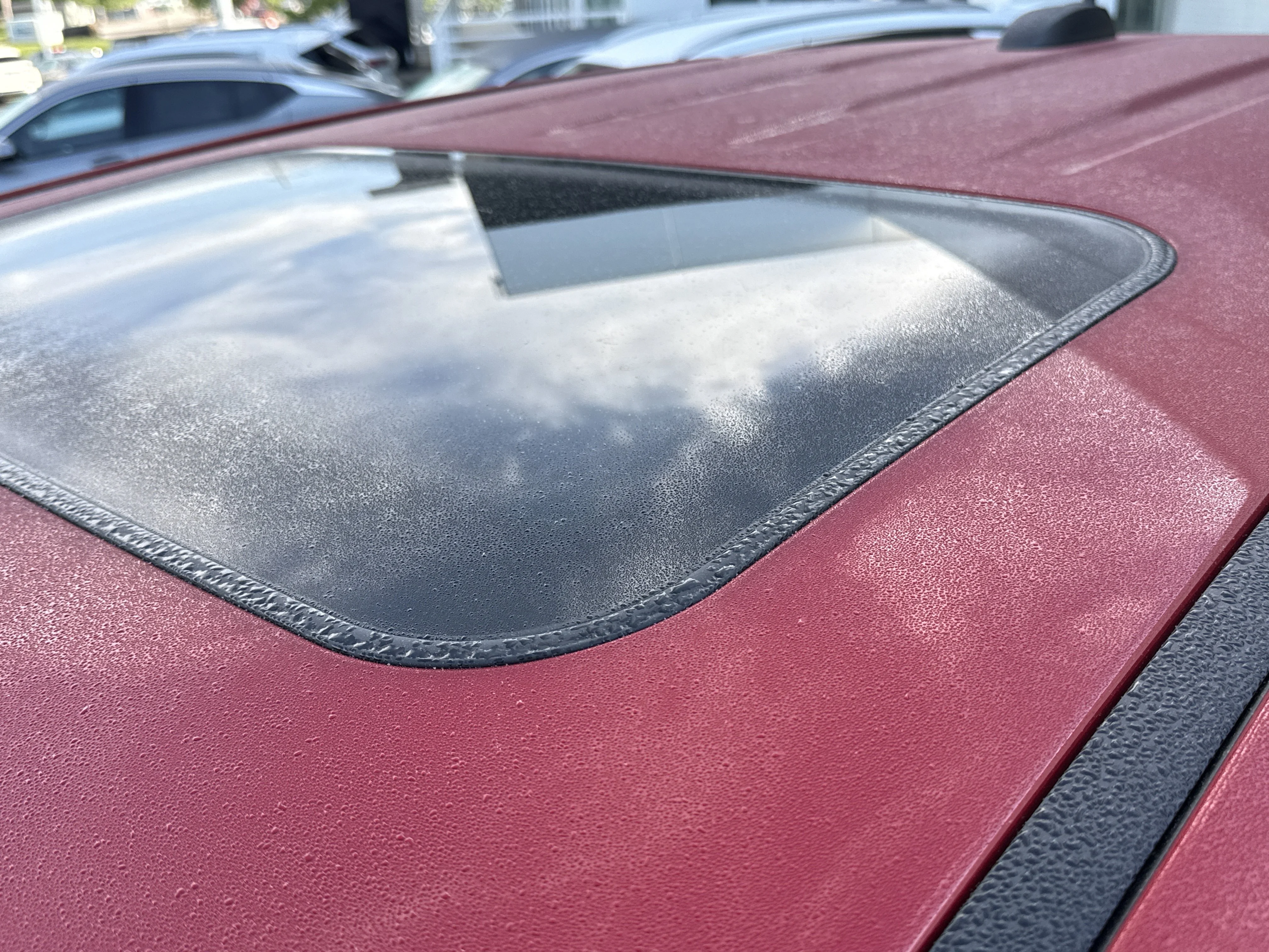 New 2026 Volcanic Red Tintcoat GMC 4WD AT4 image 15