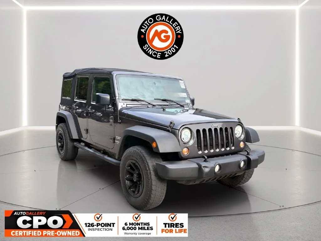 Used 2017 Gray Jeep Unlimited Sport image 1