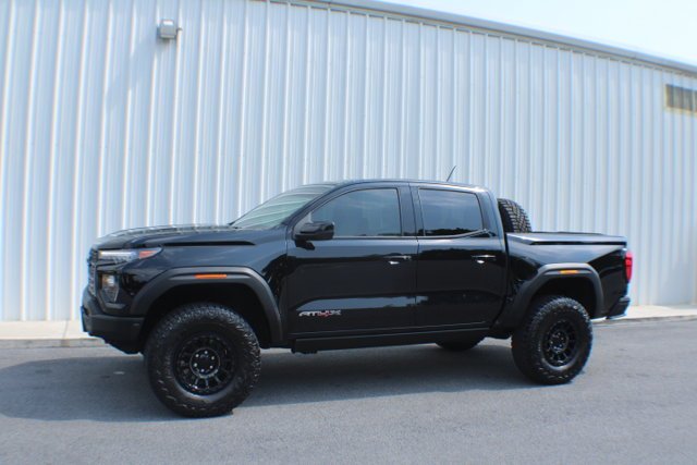 Used 2024 Onyx Black GMC 4WD AT4X image 4