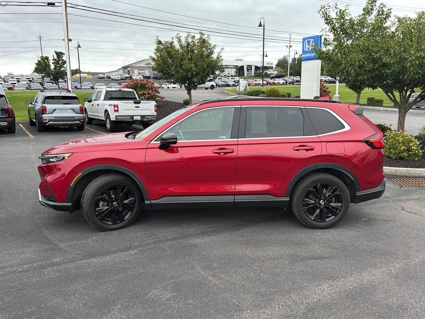Used 2024 Radiant Red Metallic Honda Sport Touring image 4
