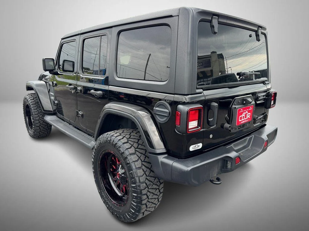 Used 2020 Black Jeep Unlimited Sahara image 4