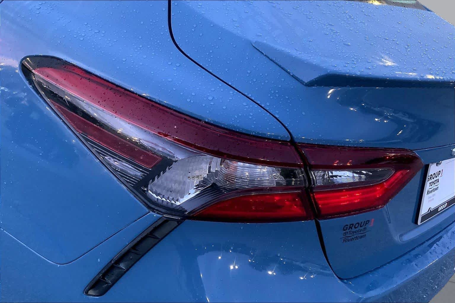 Used 2024 Cavalry Blue Toyota SE image 27