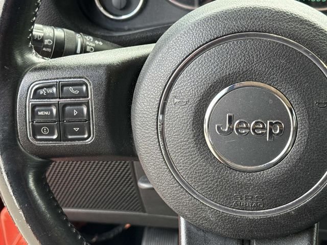 Used 2015 Orange Jeep Sahara image 21
