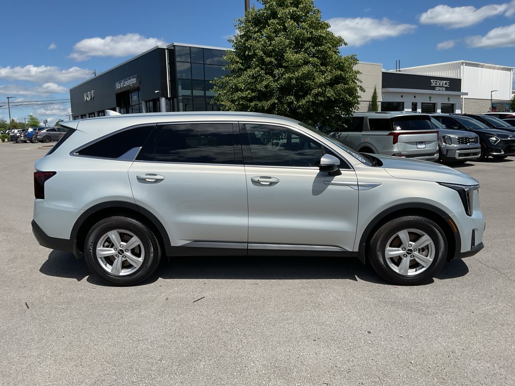 Used 2026 Ivory Silver Kia LX image 10