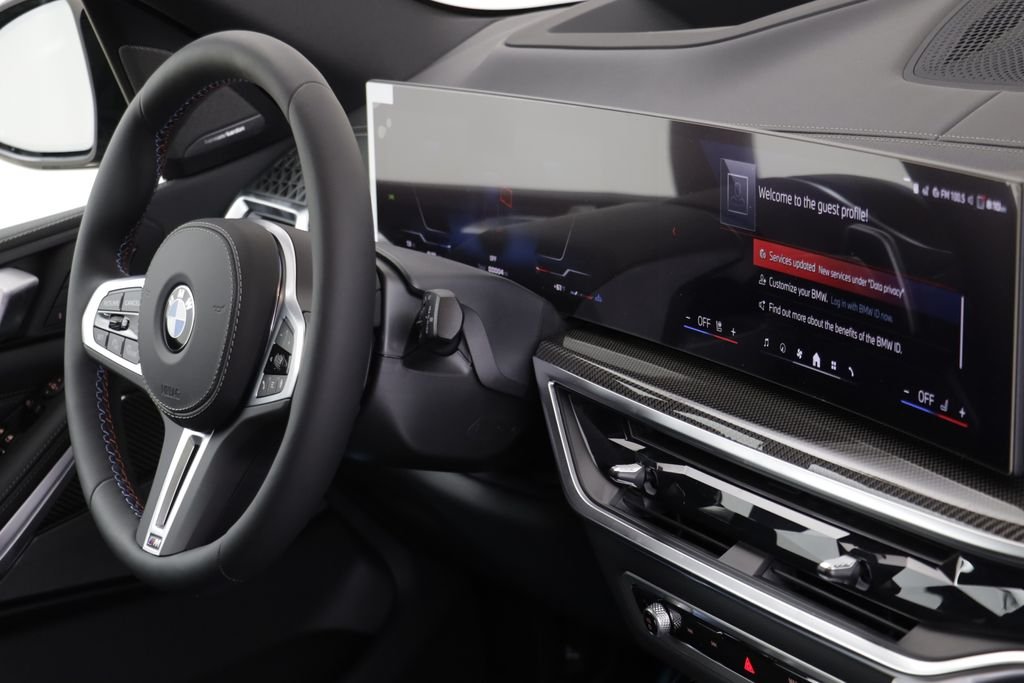 New 2026 Black Sapphire Metallic BMW M60i image 23