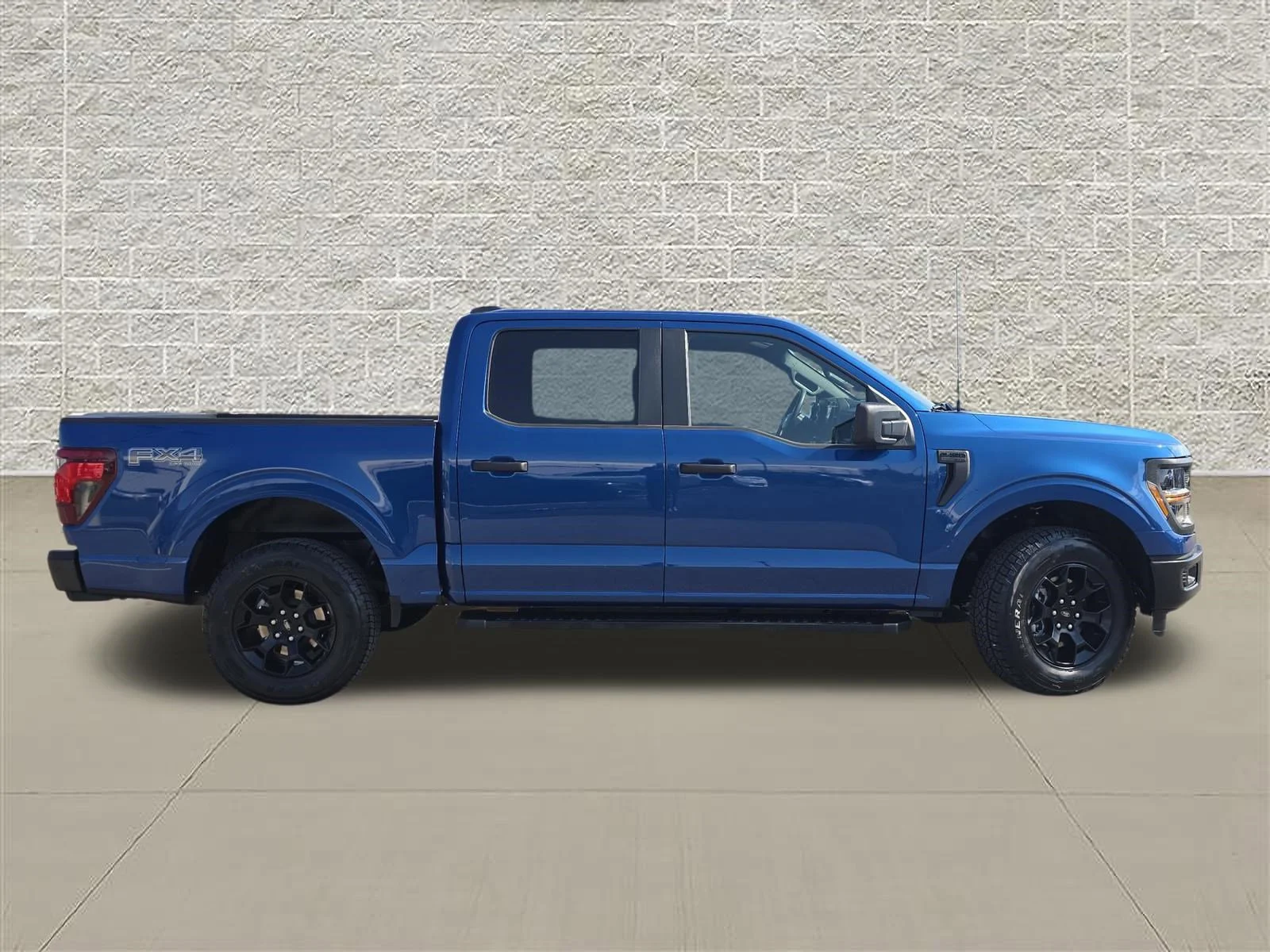 Used 2025 Blue Metallic Ford STX image 8