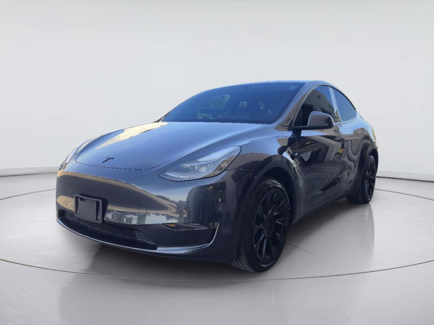 Used 2024 Solid Black Tesla Long Range image 1