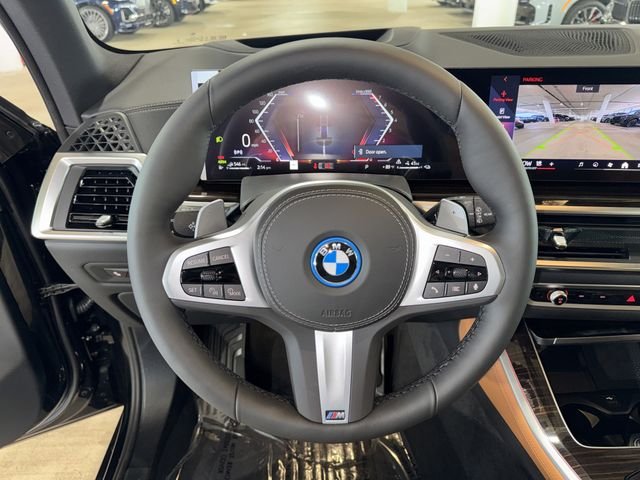 New 2026 Black Sapphire Metallic BMW xDrive50e image 16