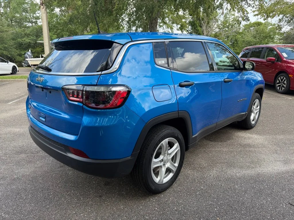 Used 2023 Laser Blue Jeep Sport image 6